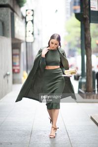olivia-culpo-is-wearing-top-and-skirt-from-topshop-jacket-from-shoes-picture-id528322792.jpg