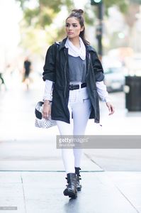 olivia-culpo-is-wearing-unravel-jacket-tops-pants-ralph-lauren-belt-picture-id541162032.jpg