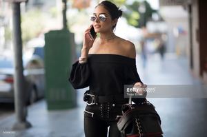 olivia-culpo-is-wearing-unravel-suede-pants-tibi-top-common-projects-picture-id540886260.jpg