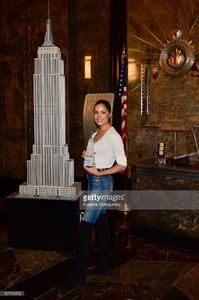 olivia-culpo-lights-the-empire-state-building-at-the-empire-state-on-picture-id527700532.jpg