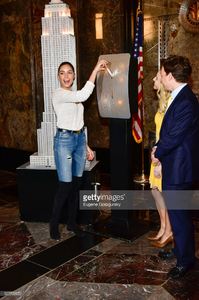 olivia-culpo-lights-the-empire-state-building-at-the-empire-state-on-picture-id527700572.jpg
