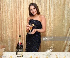 olivia-culpo-poses-with-the-signature-cocktail-for-the-2017-golden-picture-id630857444.jpg