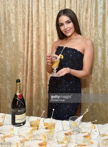 olivia-culpo-poses-with-the-signature-cocktail-for-the-2017-golden-picture-id630857480.jpg