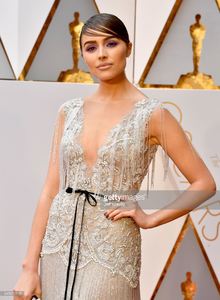 olivia-culpo-unveils-a-oneofakind-marchesa-for-stella-artois-gown-picture-id645672110.jpg