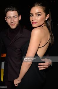 recording-artist-nick-jonas-and-actress-olivia-culpo-attend-universal-picture-id463051010.jpg