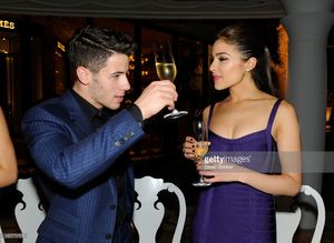 recording-artist-nick-jonas-and-miss-universe-2012-olivia-culpo-his-picture-id180773765.jpg