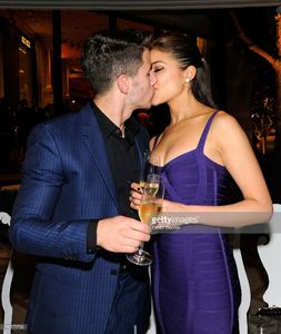 recording-artist-nick-jonas-and-miss-universe-2012-olivia-culpo-his-picture-id180773796.jpg