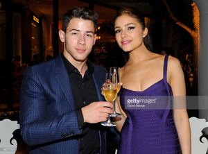 recording-artist-nick-jonas-and-miss-universe-2012-olivia-culpo-his-picture-id180773855.jpg