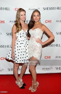 sadie-robertson-and-olivia-culpo-attend-the-evening-by-sherri-hill-picture-id180169651.jpg