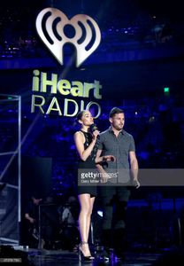 show-hosts-olivia-culpo-and-danny-amendola-speak-onstage-during-the-picture-id679781780.jpg