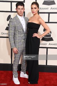 singer-nick-jonas-and-actress-olivia-culpo-attend-the-57th-annual-picture-id463013870.jpg