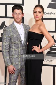 singer-nick-jonas-and-actress-olivia-culpo-attend-the-57th-annual-picture-id463013882.jpg