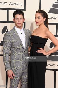 singer-nick-jonas-and-actress-olivia-culpo-attend-the-57th-annual-picture-id463017928.jpg