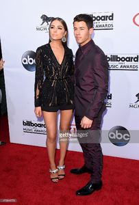 singer-nick-jonas-and-model-olivia-culpo-attend-the-2015-billboard-picture-id473844778.jpg