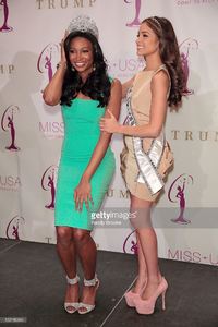 the-new-miss-usa-nana-meriwether-adjusts-her-crown-with-miss-universe-picture-id159180944.jpg