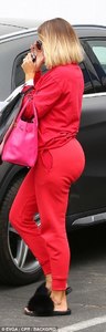 434864AC00000578-4794118-Khloe_chose_the_striking_red_tracksuit_with_black_Playboy_bunny_-a-93_1502839113120.jpg