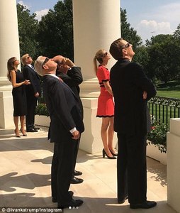4372B6D400000578-4810532-Ivanka_watches_solar_eclipse_with_the_cabinet_and_her_father-m-71_1503348365328.jpg