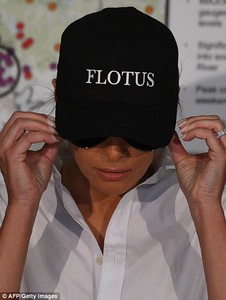 43AF551600000578-4833236-Say_her_name_The_First_Lady_also_wore_a_black_cap_with_FLOTUS_wr-a-5_1504063784520.jpg