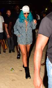 Rihanna--Wearing-a-turquoise-wig-at-a-carnival-event--16.jpg