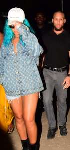 Rihanna--Wearing-a-turquoise-wig-at-a-carnival-event--24.jpg