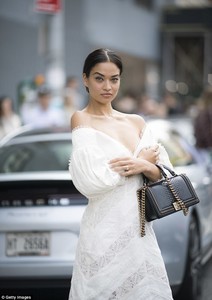 4429F5F500000578-4874440-And_the_bride_wore_white_It_won_t_be_the_last_time_Shanina_slips-a-15_1505173417542.jpg