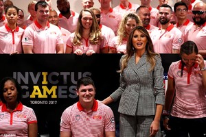 44A39E3300000578-4912946-Melania_Trump_rests_her_hand_on_a_member_of_Team_USA_s_back_ahea-a-12_1506203505569.jpg