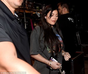 44AFAA9D00000578-4914422-Bejeeweled_Kylie_was_decked_out_in_bling_and_sports_large_diamon-m-2_1506294330979.jpg