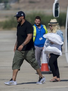 christina-aguilera-at-the-airport-in-cyprus-9717-14.jpg