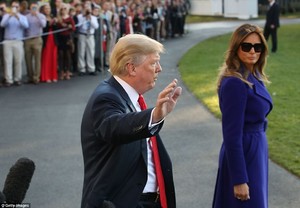 45FB0CFE00000578-5050187-The_president_and_first_lady_walk_away_after_Trump_briefly_spoke-a-13_1509835937670.jpg