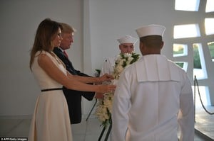 45FDFDF800000578-5048729-The_Trumps_are_seen_laying_a_wreath_at_the_USS_Arizona_Memorial_-a-30_1509770262905.jpg
