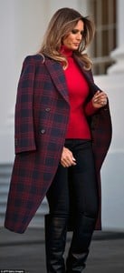 468D5C1A00000578-5101797-The_first_lady_kept_it_casual_with_a_red_top_jeans_heeled_boots_-m-17_1511219499862.jpg