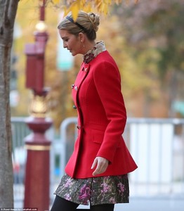 469213D600000578-5104209-Festive_Ivanka_s_bright_red_coat_was_very_fitting_for_the_holida-a-29_1511292110399.jpg