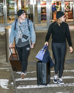 Chloe-Moretz and-Brooklyn-Beckham-at-JFK-Airport--01.jpg