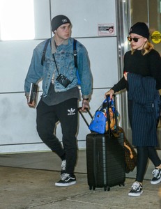 Chloe-Moretz and-Brooklyn-Beckham-at-JFK-Airport--03.jpg