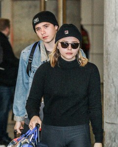 Chloe-Moretz and-Brooklyn-Beckham-at-JFK-Airport--04.jpg