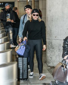 Chloe-Moretz and-Brooklyn-Beckham-at-JFK-Airport--08.jpg