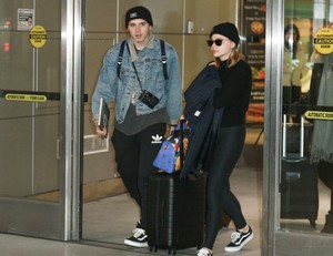 Chloe-Moretz and-Brooklyn-Beckham-at-JFK-Airport--10.jpg