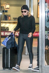 Chloe-Moretz and-Brooklyn-Beckham-at-JFK-Airport--11.jpg