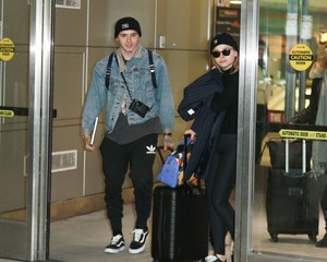 Chloe-Moretz and-Brooklyn-Beckham-at-JFK-Airport--12.jpg