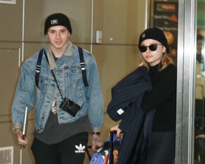 Chloe-Moretz and-Brooklyn-Beckham-at-JFK-Airport--14.jpg