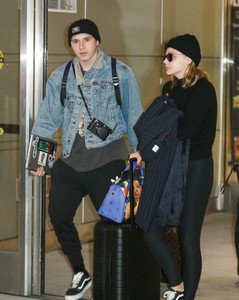 Chloe-Moretz and-Brooklyn-Beckham-at-JFK-Airport--18.jpg