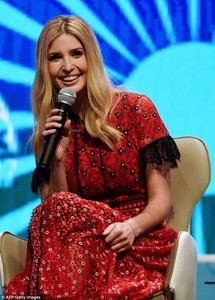 46CAC40D00000578-5134575-Colorful_The_first_daughter_donned_a_tea_length_red_dress_with_a-a-27_1512088233953.jpg