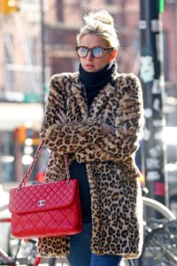 nicky-hilton-in-a-leopard-print-coat-and-red-chanel-handbag-nyc-12-06-2017-3.jpg