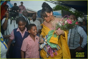 rihanna-battles-rainy-weather-at-street-naming-ceremony-in-barbados-10.jpg