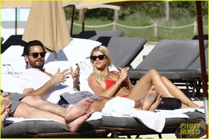 sofia-richie-scott-disick-lounge-poolside-in-miami-03.jpg