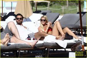 sofia-richie-scott-disick-lounge-poolside-in-miami-05.jpg