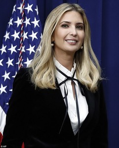 483434E100000578-5276659-Classic_with_a_twist_Ivanka_who_paired_the_pants_with_a_ribbon_t-m-27_1516139629240.jpg