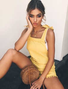 5655a6780d949a2311ce94032e426d9a_eli-playsuit-orange.jpg