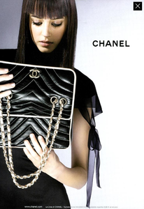 Lagerfeld_Chanel_Handbags_Spring_Summer_2003.thumb.png.632a99a5ed32b56fb0a9478e992261e2.png