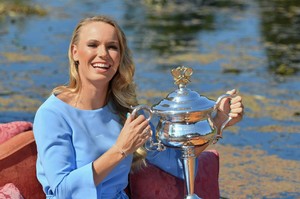 caroline-wozniacki-poses-with-her-trophy-in-melbourne-3.jpg